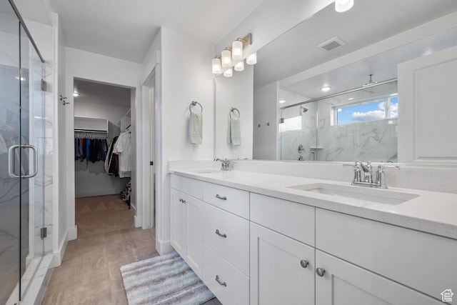 2447 W Santa Fe Dr, Mapleton, UT 84664 - full bath with a marble finish shower, double vanity, and a walk in closet