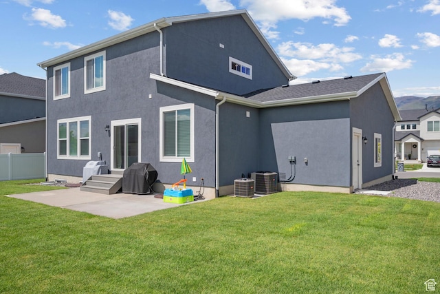 2447 W Santa Fe Dr, Mapleton, UT 84664 - rear view of house featuring a patio, stucco siding, and central AC unit