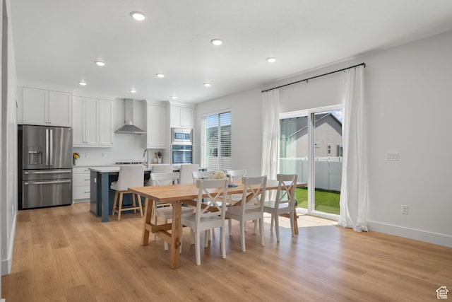 2447 W Santa Fe Dr, Mapleton, UT 84664 - dining area featuring recessed lighting, light wood finished floors, and baseboards