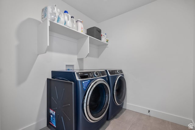 2447 W Santa Fe Dr, Mapleton, UT 84664 - washroom with independent washer and dryer and baseboards