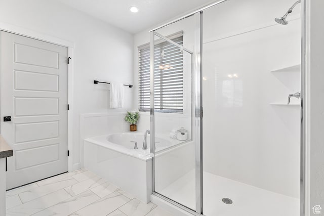 1547 E Cardinal Dr N, Eagle Mountain, UT 84005 - full bath with a stall shower, a garden tub, marble finish floors, and recessed lighting