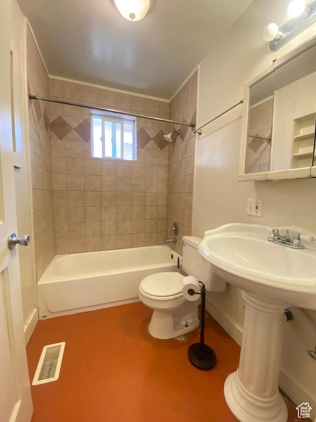 829 E Markea Ave, Salt Lake City, UT 84102 - bathroom featuring  shower combination, toilet, baseboards, and a sink