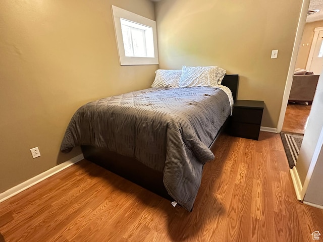 829 E Markea Ave, Salt Lake City, UT 84102 - bedroom featuring wood finished floors and baseboards