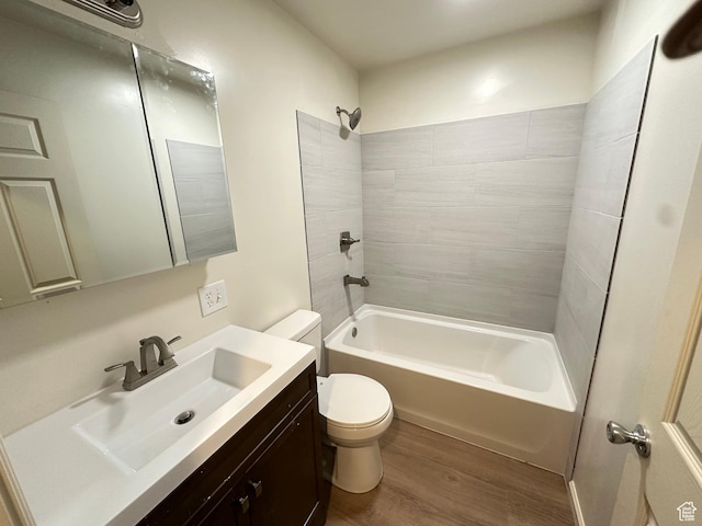 829 E Markea Ave, Salt Lake City, UT 84102 - bathroom featuring wood finished floors, toilet, vanity, and bathing tub / shower combination