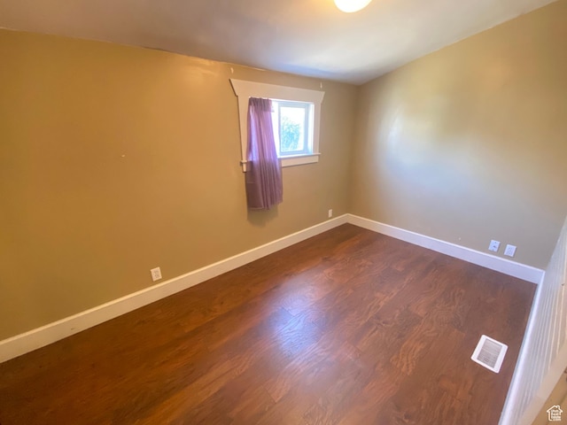 829 E Markea Ave, Salt Lake City, UT 84102 - empty room with dark wood finished floors and baseboards