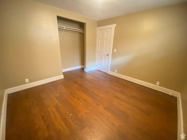 829 E Markea Ave, Salt Lake City, UT 84102 - unfurnished bedroom with wood finished floors, baseboards, and a closet