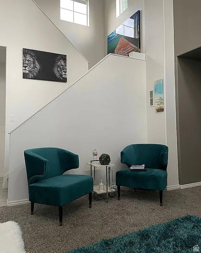 6680 S Leichen Ct, West Jordan, UT 84081 - sitting room with carpet flooring and baseboards
