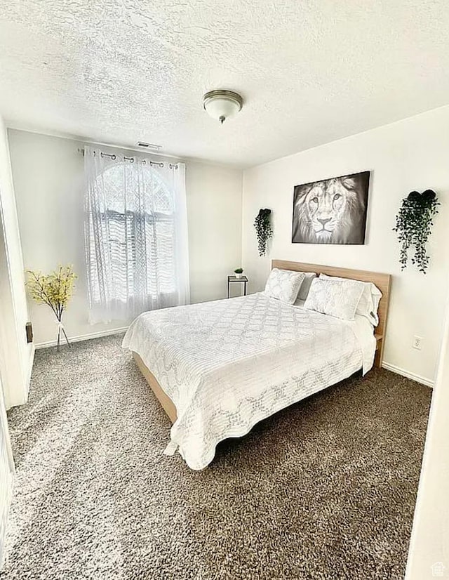 6680 S Leichen Ct, West Jordan, UT 84081 - bedroom with carpet flooring, baseboards, and a textured ceiling