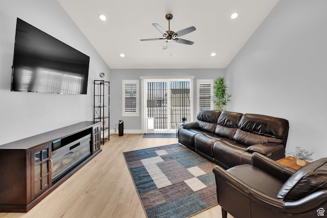 257 N 1125 W, Clearfield, UT 84015 - living area with lofted ceiling, ceiling fan, light wood finished floors, recessed lighting, and baseboards