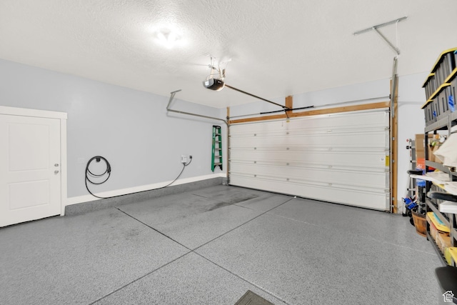 257 N 1125 W, Clearfield, UT 84015 - garage featuring a garage door opener and baseboards