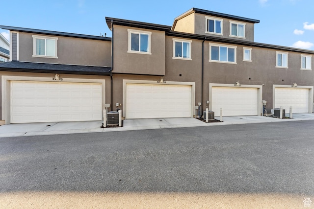 3324 W 3745 S Unit 4065, West Haven, UT 84401 - view of front facade with stucco siding and central AC
