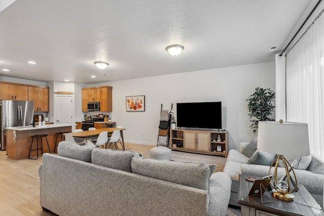 3324 W 3745 S Unit 4065, West Haven, UT 84401 - living room with light wood-style flooring, recessed lighting, and baseboards