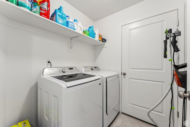 3324 W 3745 S Unit 4065, West Haven, UT 84401 - laundry area featuring separate washer and dryer and light tile patterned floors