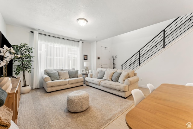 3324 W 3745 S Unit 4065, West Haven, UT 84401 - living area featuring stairs and a textured ceiling