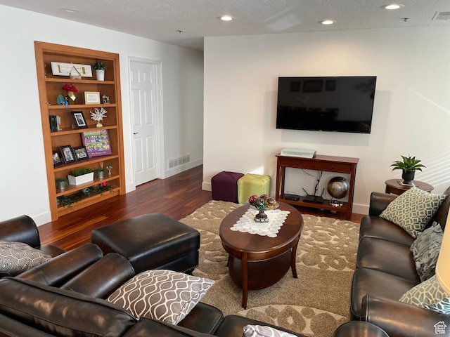 44 W 300 S Unit 1107N, Salt Lake City, UT 84101 - living room with wood finished floors, baseboards, recessed lighting, and a textured ceiling