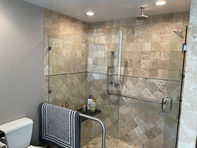 44 W 300 S Unit 1107N, Salt Lake City, UT 84101 - bathroom with a stall shower, toilet, and recessed lighting