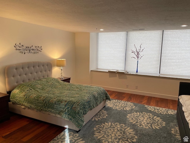 44 W 300 S Unit 1107N, Salt Lake City, UT 84101 - bedroom with wood finished floors and baseboards