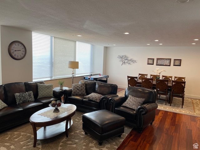 44 W 300 S Unit 1107N, Salt Lake City, UT 84101 - living room featuring wood finished floors, recessed lighting, baseboards, and a textured ceiling