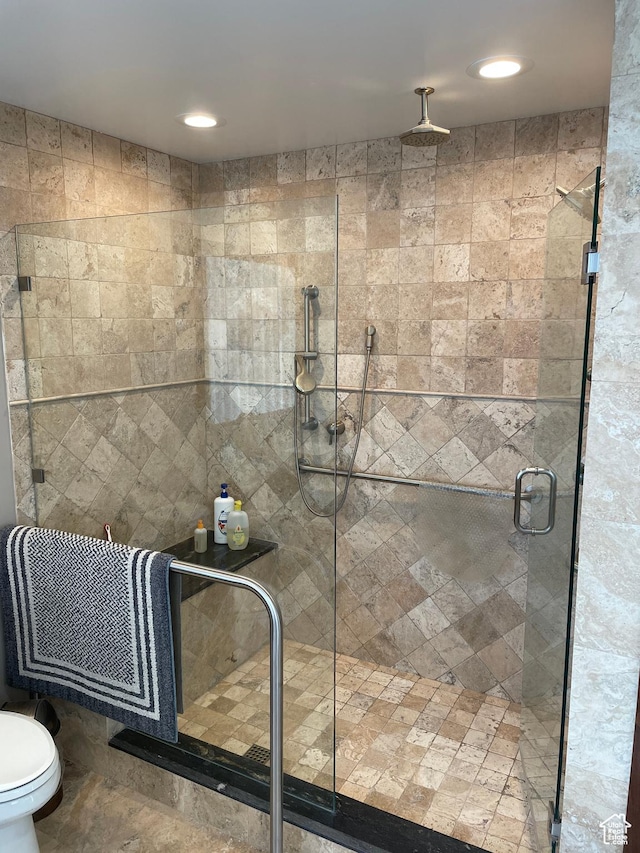 44 W 300 S Unit 1107N, Salt Lake City, UT 84101 - full bathroom with a stall shower, toilet, and recessed lighting