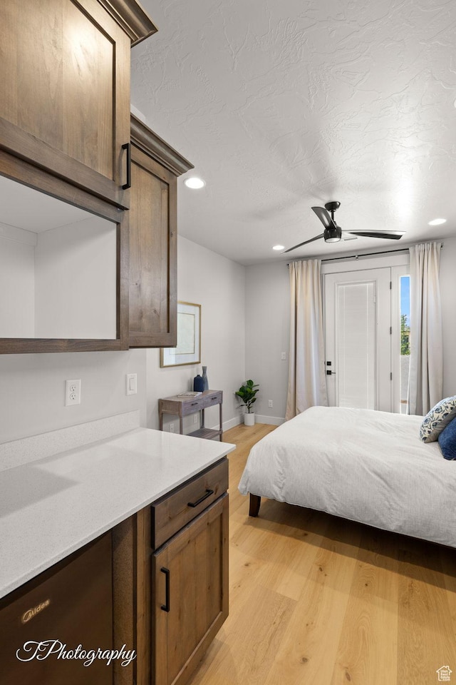3134 E Blue Heron Dr S, St George, UT 84790 - bedroom with access to exterior, light wood-style flooring, recessed lighting, baseboards, and a textured ceiling