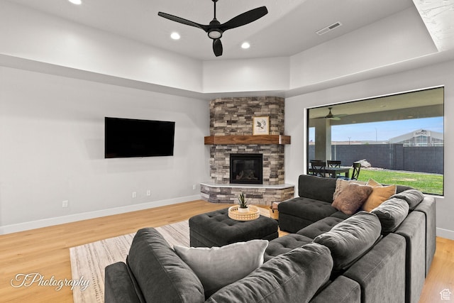3134 E Blue Heron Dr S, St George, UT 84790 - living room with ceiling fan, light wood-style floors, a fireplace, baseboards, and recessed lighting