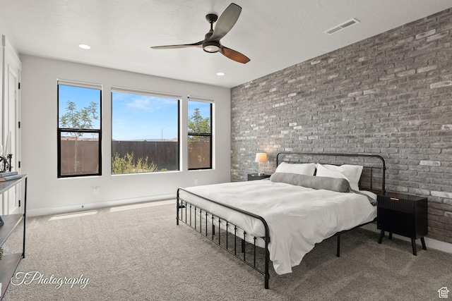 3134 E Blue Heron Dr S, St George, UT 84790 - carpeted bedroom with brick wall, baseboards, a ceiling fan, and recessed lighting