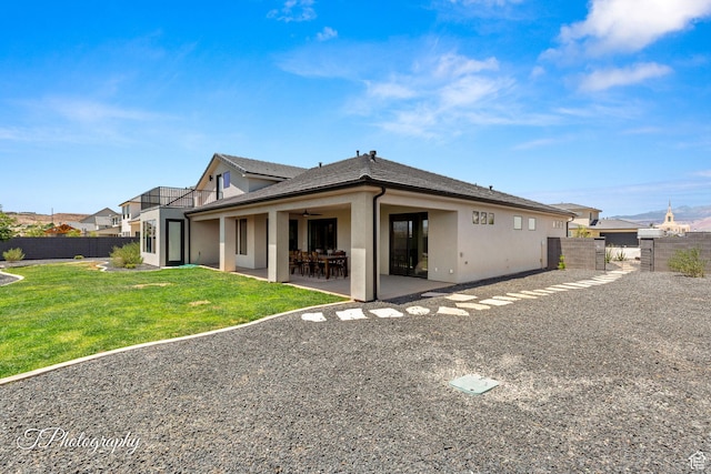 3134 E Blue Heron Dr S, St George, UT 84790 - rear view of property featuring stucco siding, a patio, and a ceiling fan