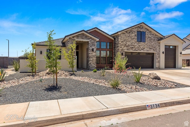 3134 E Blue Heron Dr S, St George, UT 84790 - view of front of house featuring stone siding, stucco siding, an attached garage, driveway, and a tile roof
