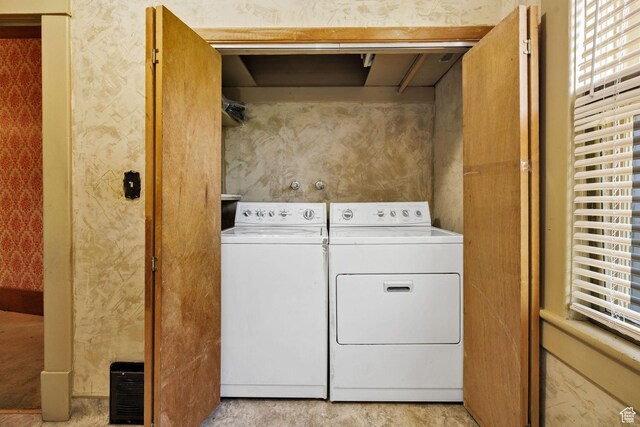 157 N 500 W, Logan, UT 84321 - washroom featuring separate washer and dryer, wallpapered walls, and healthy amount of natural light