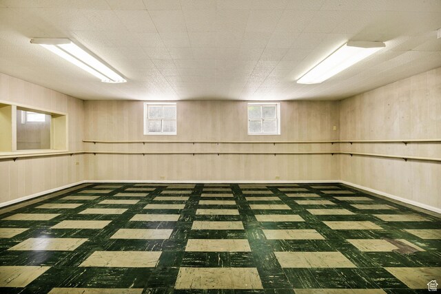 157 N 500 W, Logan, UT 84321 - below grade area with tile patterned floors and wooden walls