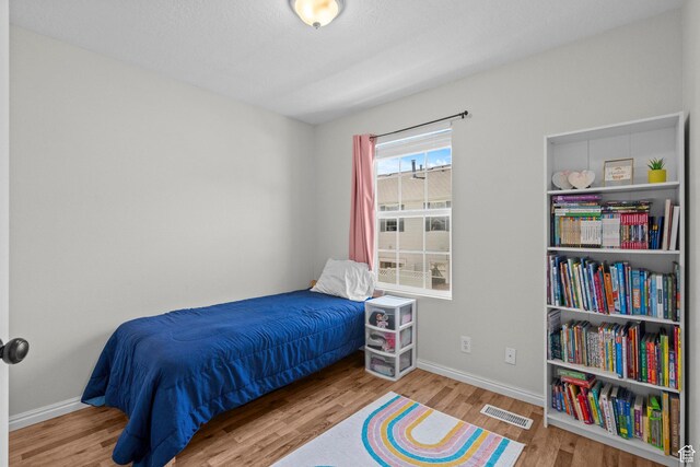 79 W 1970 N, Tooele, UT 84074 - bedroom featuring wood finished floors and baseboards
