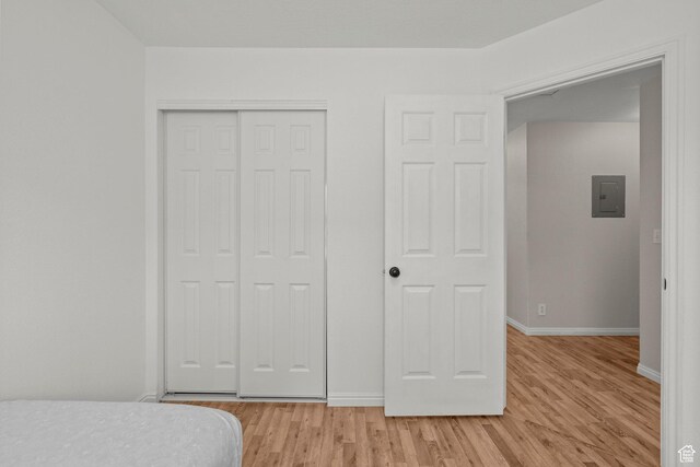 79 W 1970 N, Tooele, UT 84074 - bedroom with a closet, light wood finished floors, baseboards, and electric panel