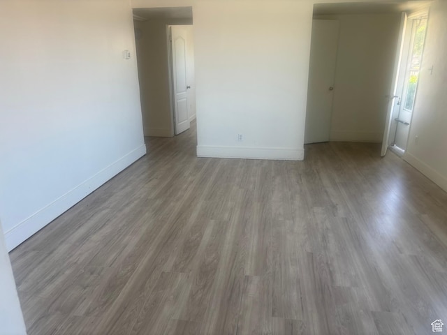 4575 W 4925 S, Kearns, UT 84118 - empty room featuring baseboards and wood finished floors