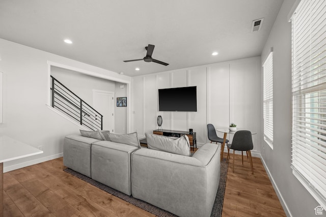 5087 W Rambutan Way S, Jordan, UT 84009 - living area with wood finished floors, a ceiling fan, recessed lighting, stairway, and baseboards