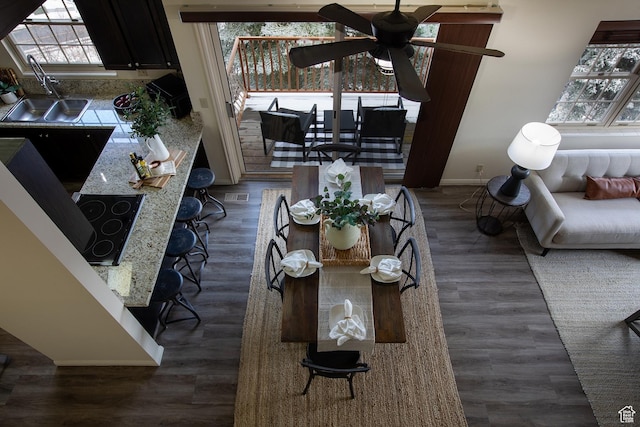 874 W Schneitter Cir Unit 7, Midway, UT 84049 - dining area with plenty of natural light, baseboards, ceiling fan, and wood finished floors