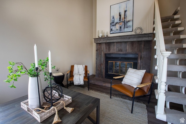 874 W Schneitter Cir Unit 7, Midway, UT 84049 - living area featuring wood finished floors, a glass covered fireplace, and baseboards