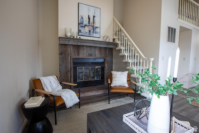 874 W Schneitter Cir Unit 7, Midway, UT 84049 - sitting room featuring wood finished floors, a glass covered fireplace, and stairs