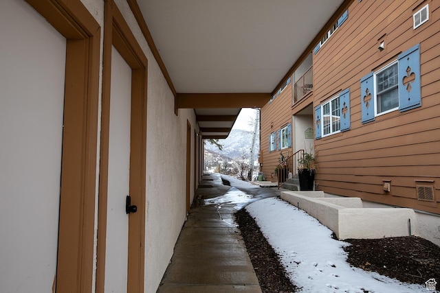 874 W Schneitter Cir Unit 7, Midway, UT 84049 - view of snow covered exterior with a mountain view and stucco siding