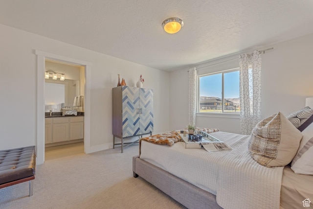 1344 N 1400 E Unit 02-07, Payson, UT 84651 - bedroom featuring light carpet, connected bathroom, and baseboards
