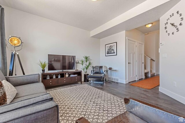 1344 N 1400 E Unit 02-07, Payson, UT 84651 - living room featuring wood finished floors and baseboards