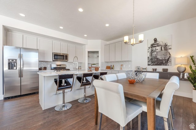 1344 N 1400 E Unit 02-07, Payson, UT 84651 - dining area featuring dark wood-style flooring, a chandelier, and recessed lighting