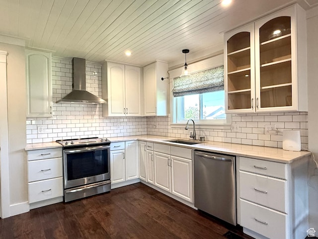 737 S 400 E, Payson, UT 84651 - kitchen featuring wall chimney range hood, appliances with stainless steel finishes, a sink, wood ceiling, and light countertops