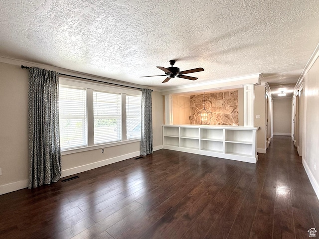 737 S 400 E, Payson, UT 84651 - unfurnished living room featuring a ceiling fan, dark wood-type flooring, crown molding, a textured ceiling, and baseboards