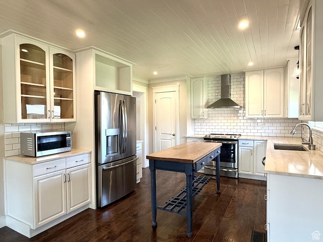 737 S 400 E, Payson, UT 84651 - kitchen with appliances with stainless steel finishes, wall chimney exhaust hood, a sink, recessed lighting, and tasteful backsplash