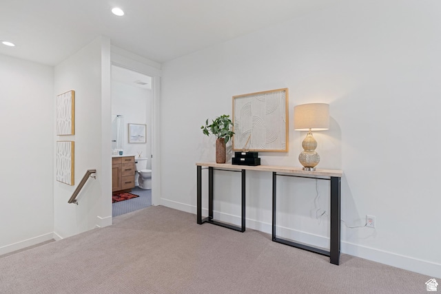 1782 E Bermondsey Ct, Holladay, UT 84117 - hallway featuring light carpet, baseboards, and recessed lighting