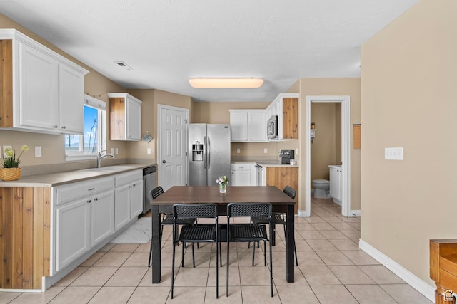 1099 W 200 S, Springville, UT 84663 - dining room with light tile patterned floors and baseboards