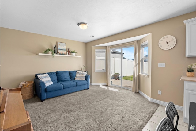 1099 W 200 S, Springville, UT 84663 - living area featuring baseboards, light tile patterned floors, and light colored carpet