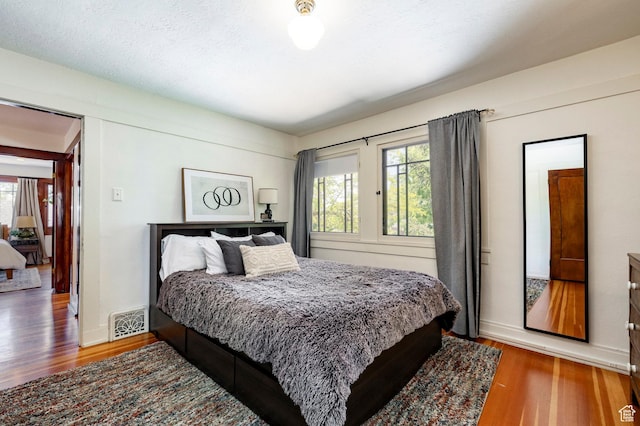 1376 E Perry Ave, Salt Lake City, UT 84103 - bedroom with wood finished floors