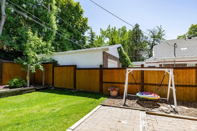 1376 E Perry Ave, Salt Lake City, UT 84103 - fenced backyard with a patio area and a garage
