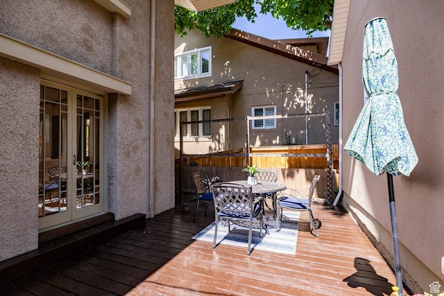1376 E Perry Ave, Salt Lake City, UT 84103 - wooden deck featuring outdoor dining area and french doors